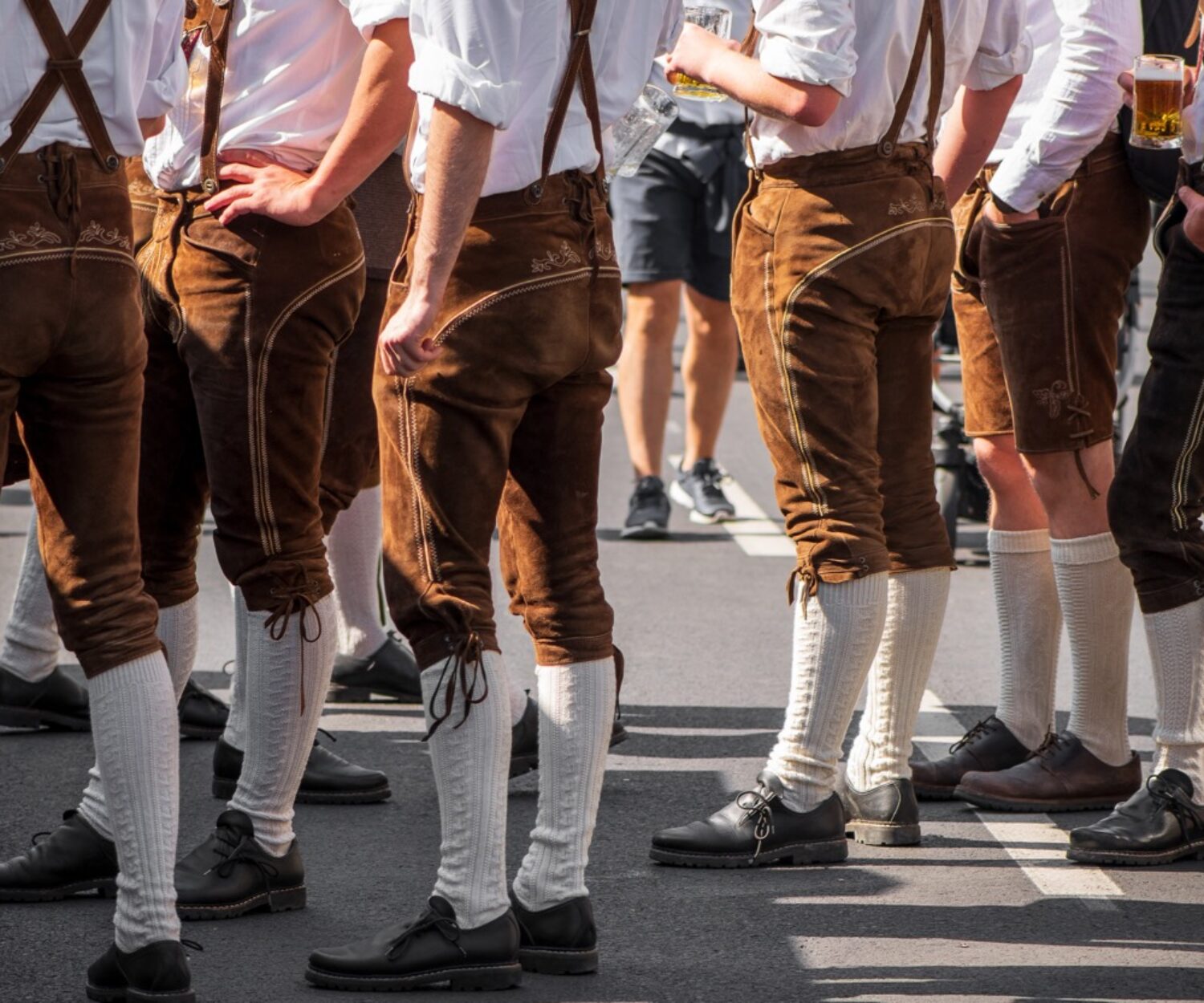 Guys in rented oktoberfest outfits at oktoberfest