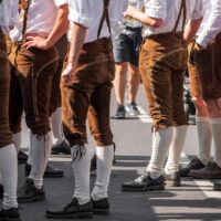 Guys in rented oktoberfest outfits at oktoberfest