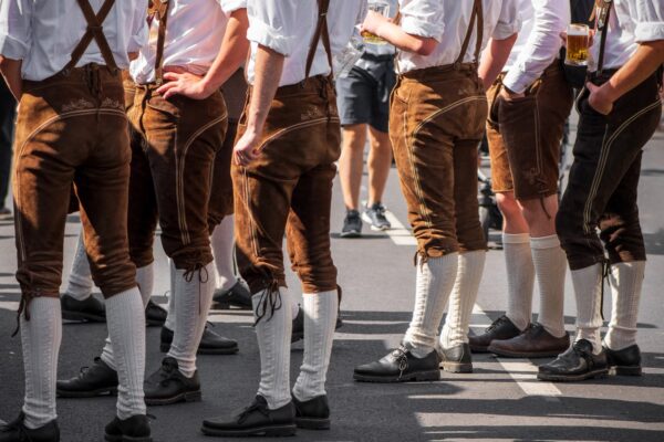 Guys in rented oktoberfest outfits at oktoberfest